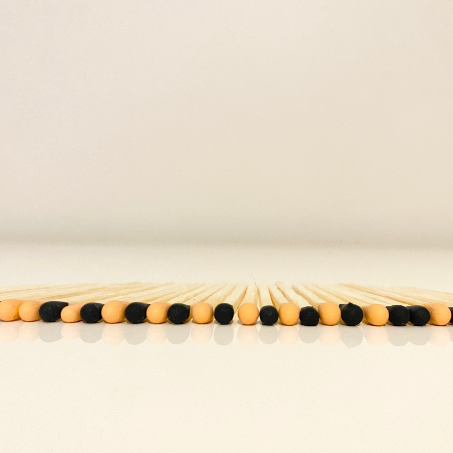 4.8 cm halloween inspired matches on white surface.