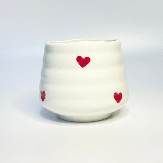 white match holder with red hearts
