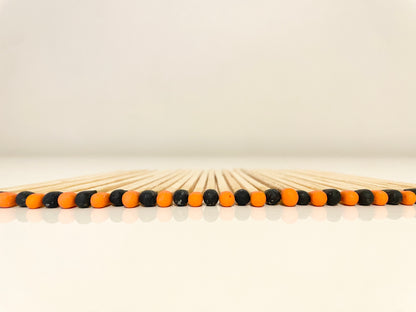 9.8 cm halloween inspired matches on white surface.