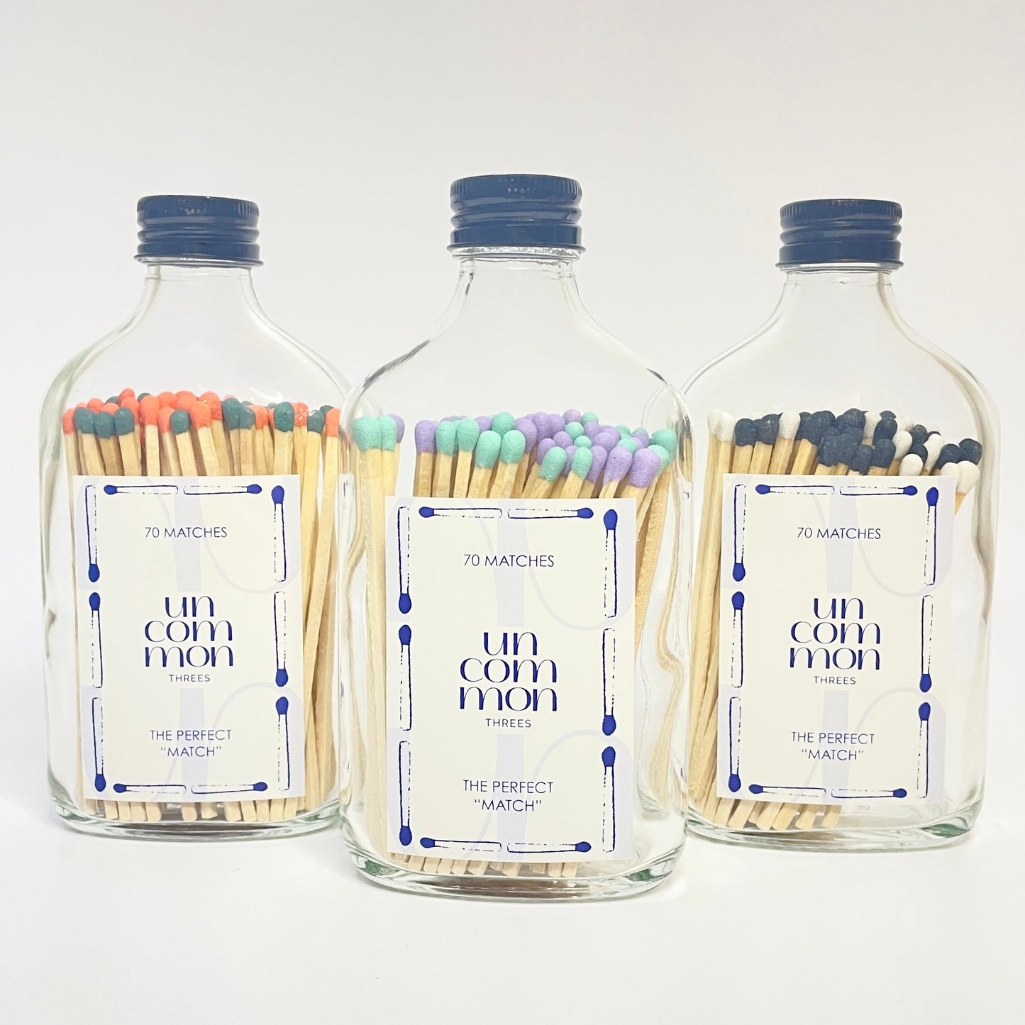 Match bottles filled with two vibrant shades of 9.8cm long coloured safety matches.