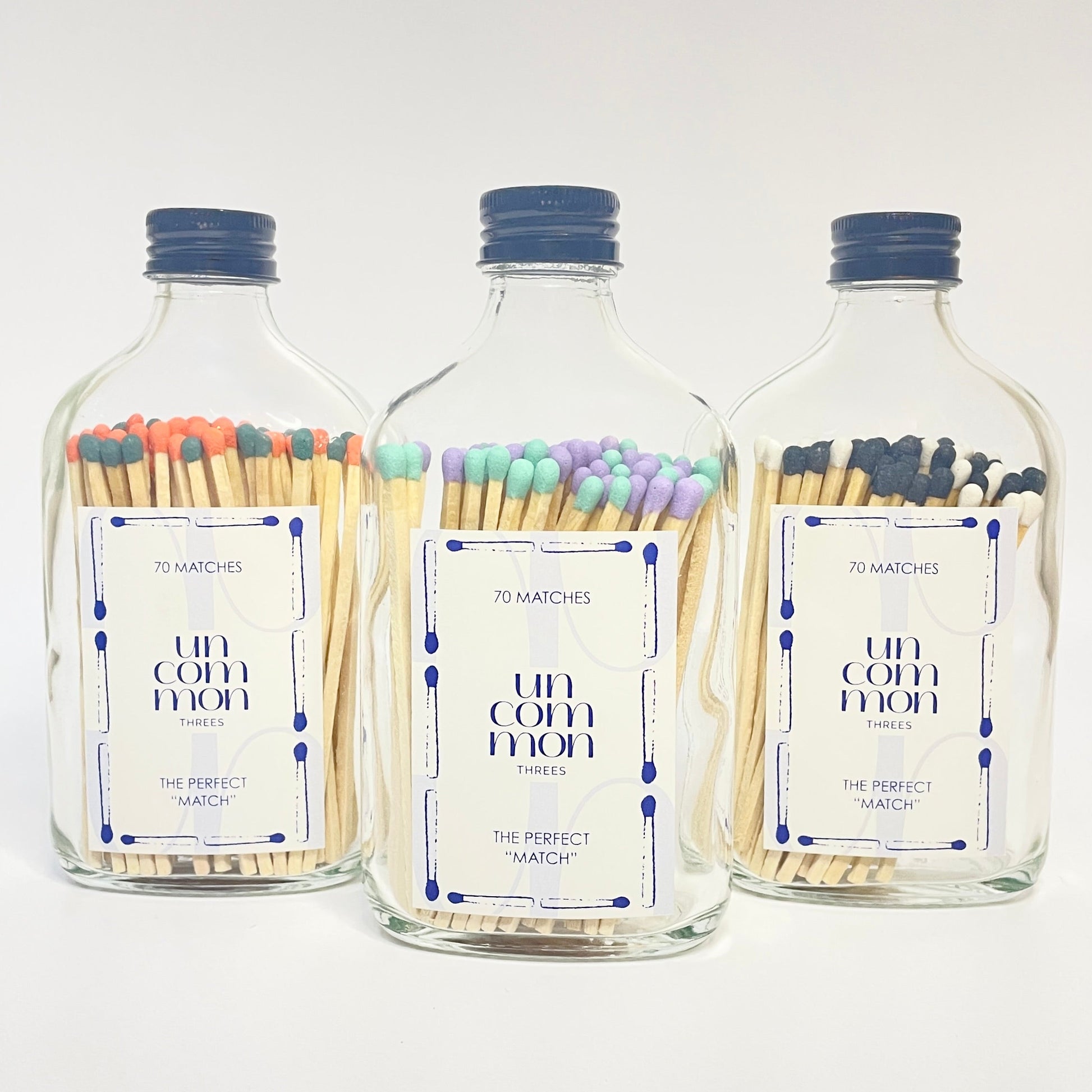 Match bottles filled with two vibrant shades of 9.8cm long coloured safety matches.