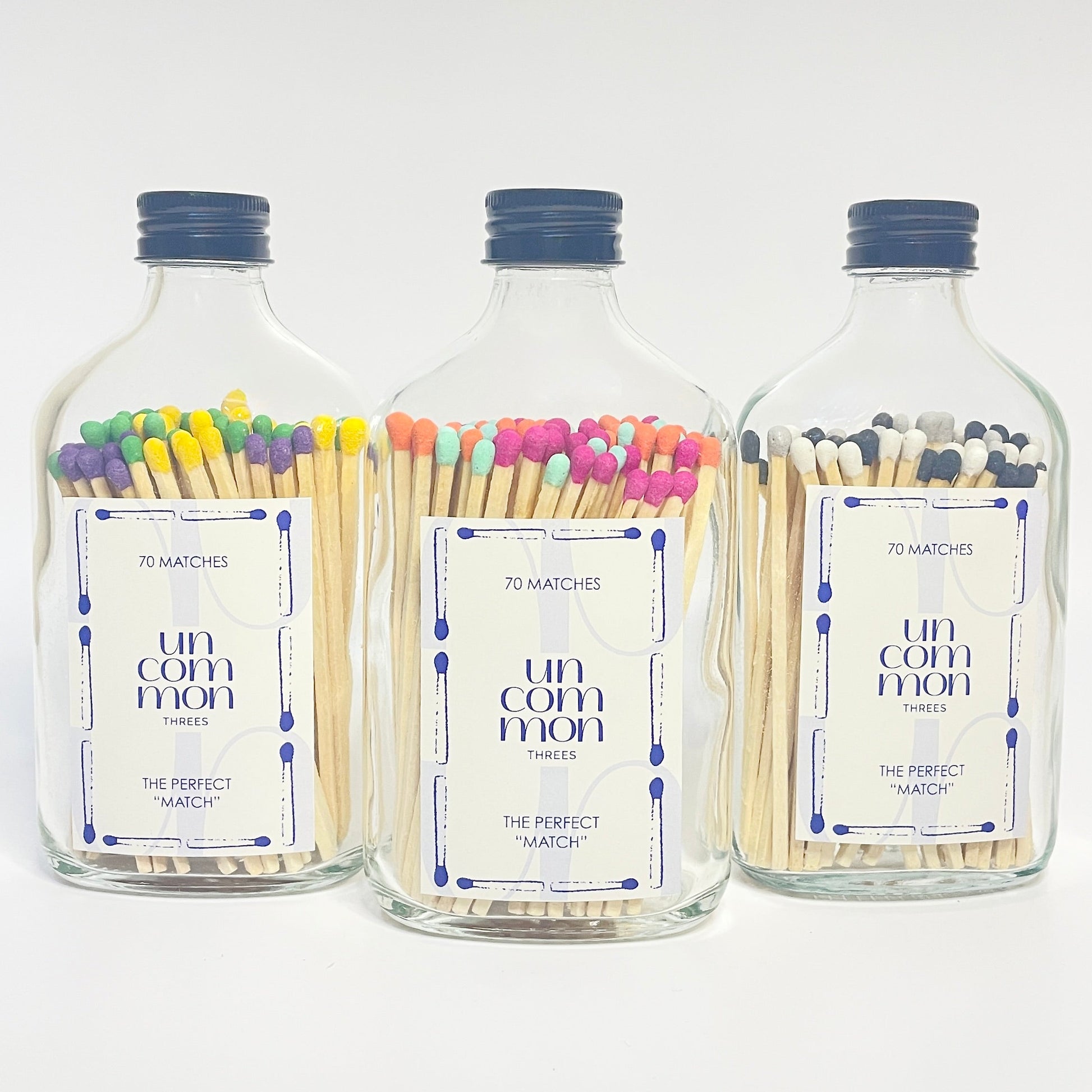 Match bottles filled with three vibrant shades of 9.8cm long coloured safety matches.