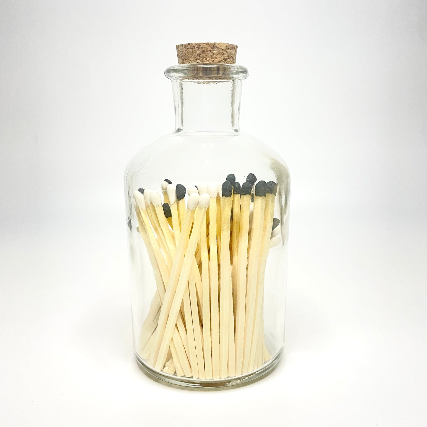 Apothecary match bottle filled with 7.5 cm chess matches. 