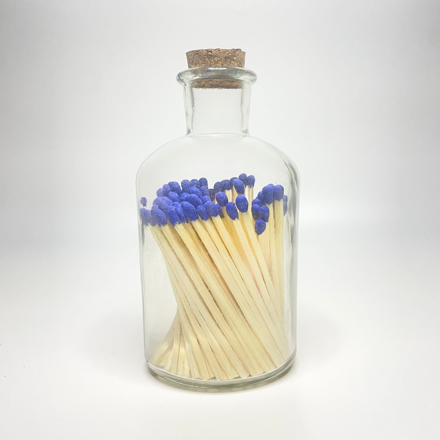 Apothecary match bottle filled with 7.5 cm electric blue matches. 