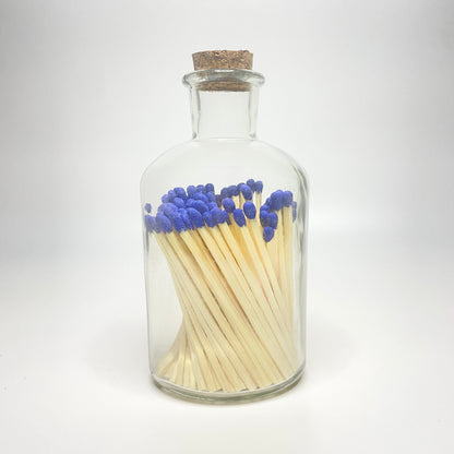 Apothecary match bottle filled with 7.5 cm electric blue matches. 