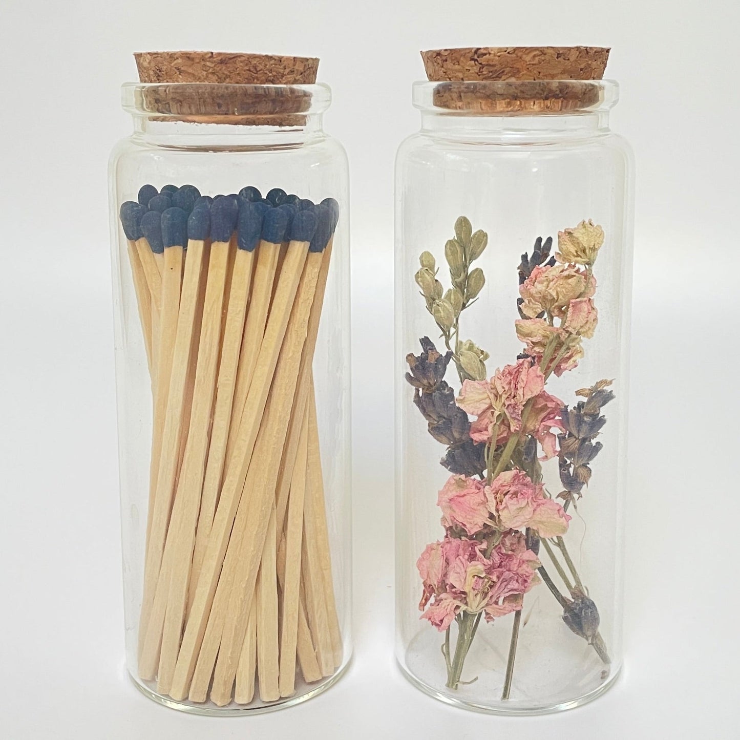 Dried flower test tube gift set with glass match bottle containing 50 safety matches.