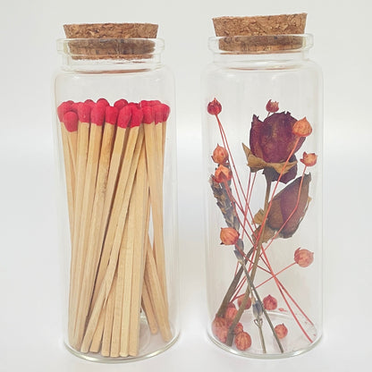 Dried flower test tube gift set with glass match bottle containing 50 safety matches.