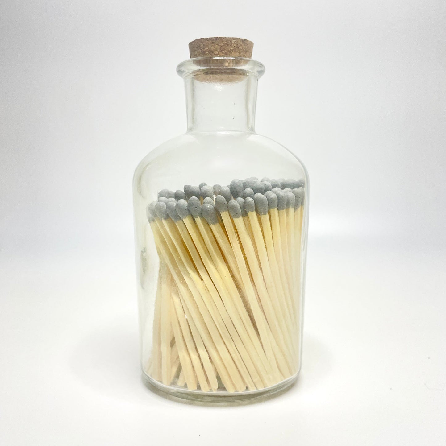 Apothecary match bottle filled with 7.5 cm grey matches. 