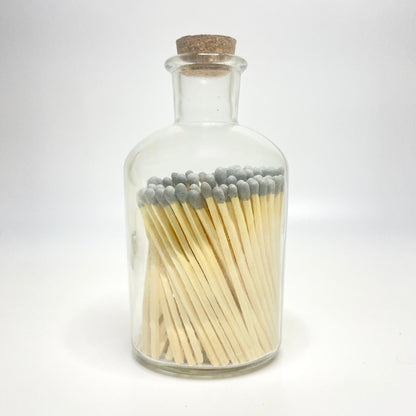 Apothecary match bottle filled with 7.5 cm grey matches. 