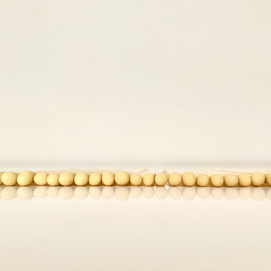 7.5 cm yellow matches on a white surface. 