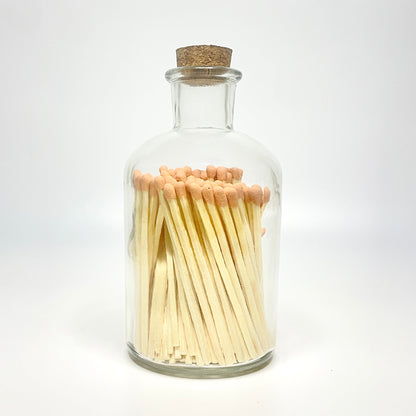 Apothecary match bottle filled with 7.5 cm orange matches. 