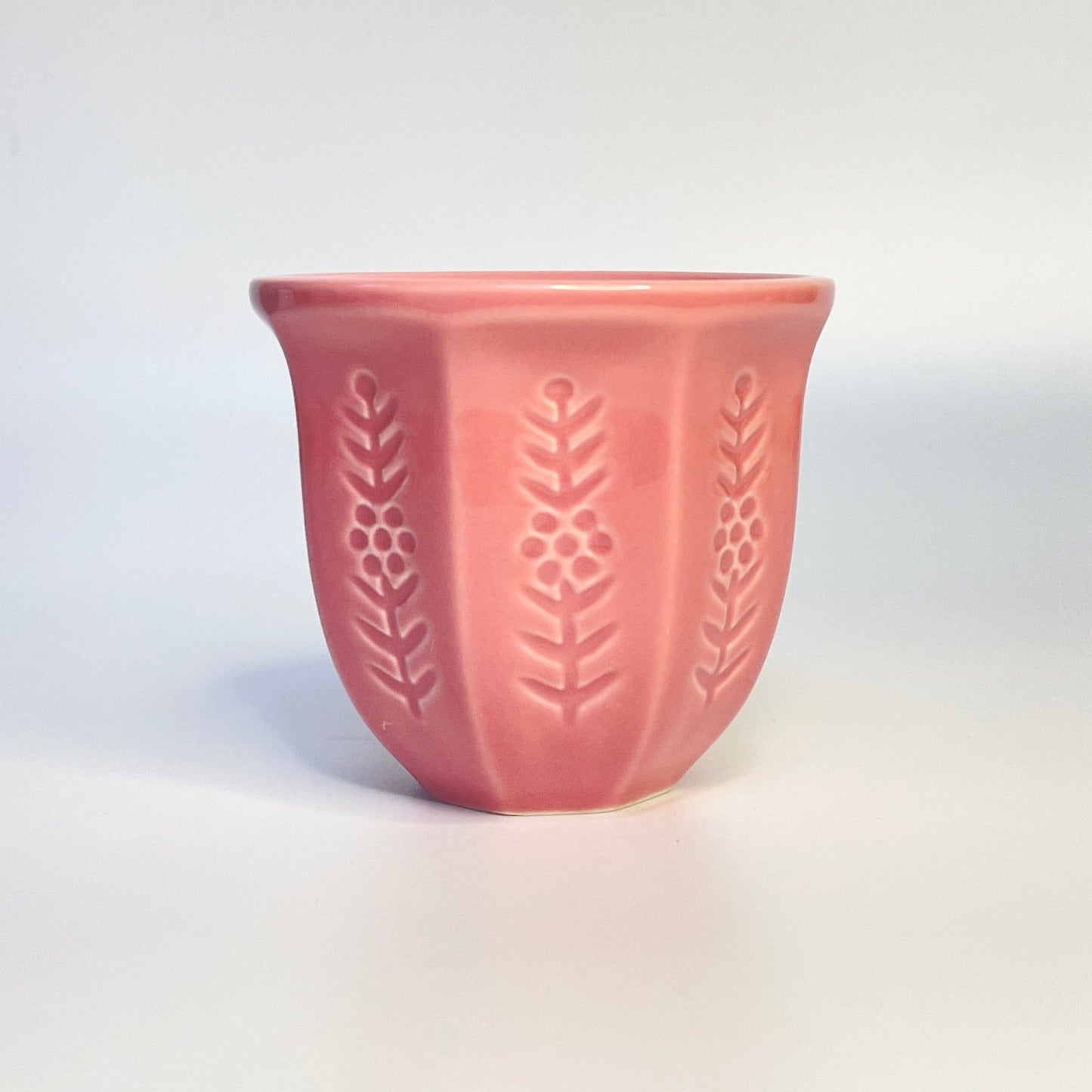 Pink match holder/coffee cup. 
