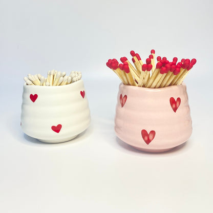 Pink & White match holders with red and white coloured safety matches.