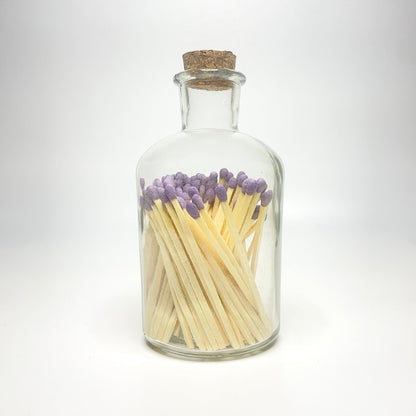 Apothecary match bottle filled with 7.5 cm purple matches. 