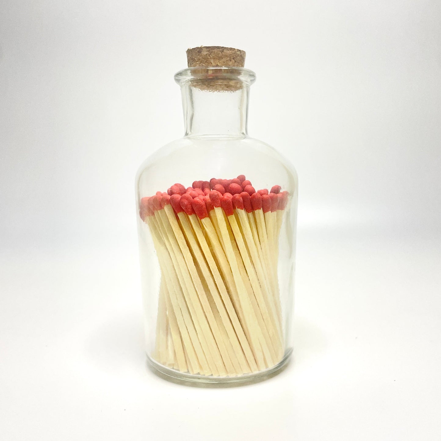 Apothecary match bottle filled with 7.5 cm red matches. 