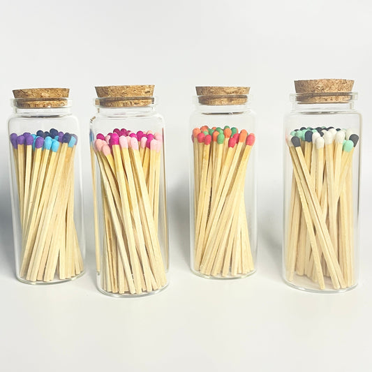 Colourful long 9.8 cm safety matches in glass test tube with cork lid.