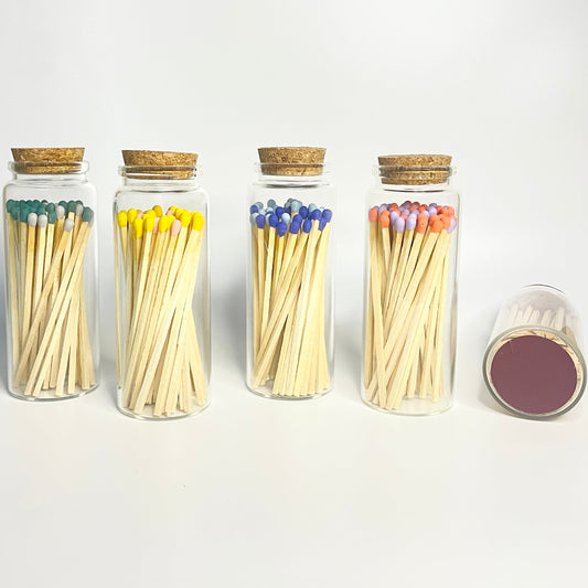 Colourful long 9.8 cm safety matches in glass test tube with cork lid.