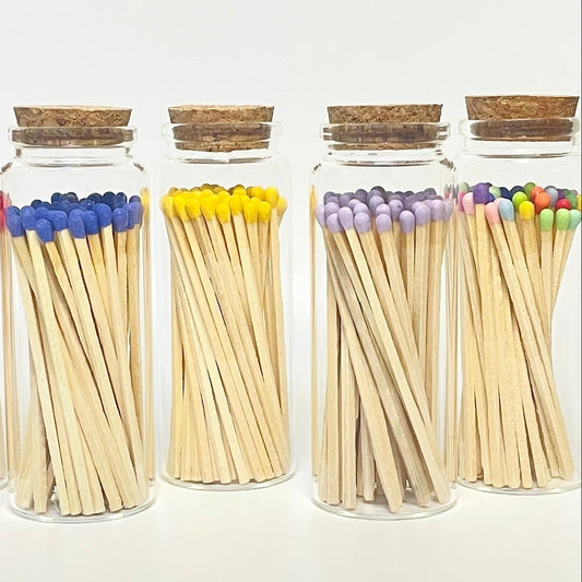 Colourful long 9.8 cm safety matches in glass test tube with cork lid.