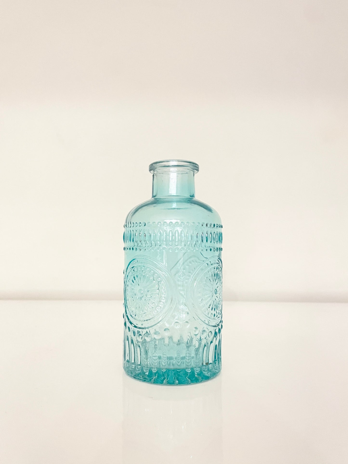 A beautiful vintage glass vase in blue.