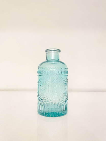 A beautiful vintage glass vase in blue.