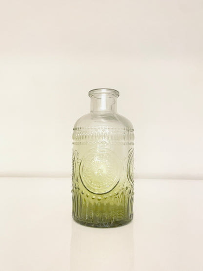 A beautiful vintage glass vase in green.